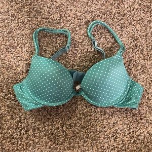 Arie brand aqua colored with white polka dots bra.